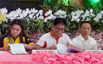 Bicol public schools receive laptops from power firm, NGO