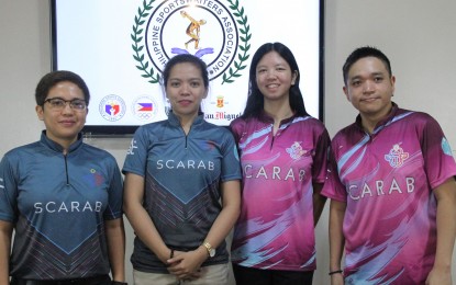 <p><strong>AMIT CUP</strong>. World billiards champion and Amit Cup 9-Ball Championship founder Rubilen Amit poses for a photo with Leg 3 winners Charis Santos and Shane Lui Mongcal and co-founder Ren De Vera (from left) after the Philippine Sportswriters Association Forum at the Rizal Memorial Coliseum conference hall in Malate, Manila on Tuesday (Dec. 5, 2023). The 4th leg of the Amit Cup Season 2 will be held between the end of January and early February next year.<em> (PNA photo by Jess M. Escaros Jr.)</em></p>