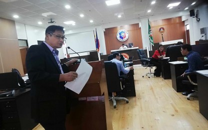 <p><strong>CEASE AND DESIST ORDER.</strong> Chair of the Provincial Board’s Committee on History and Cultural Heritage, Egidio Elio, relates to fellow board members during Monday's (Dec. 11, 2023) regular session that a cease and desist order was issued by the National Historical Commission of the Philippines (NHCP) against the renovation of the President Diosdado Macapagal District Hospital in Tobias Fornier town. The 56-year-old hospital is considered with historical value. <em>(PNA photo by Annabel Consuelo J. Petinglay)</em></p>