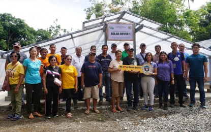 <p><strong>ENTERPRISE PACKAGE.</strong> Members of the Malalag Cacao Growers Association (MACAGROA) receive PHP6 million worth of enterprise packages from the Department of Agriculture-Philippine Rural Development Project (DA-PRDP) on Tuesday (Dec. 12, 2023). The association and its farmer members received a solar dryer facility, hauling and delivery truck, motorcycle, truck shed and additional working capital to purchase wet cacao beans. <em>(Photo from DA-PRDP)</em></p>