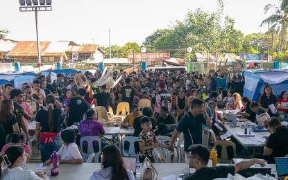 <p><strong>FIRE VICTIMS.</strong> The 1,575 families left homeless due to a fire at Sta. Maria, Pusok, Lapu-Lapu City are now housed in an evacuation center at Marcelo Fernan Park. Gov. Gwendolyn Garcia led other donors in extending donations for the fire victims by donating PHP10 million. <em>(Photo courtesy of Lapu-Lapu City PIO)</em></p>