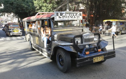 <p><strong>JEEPNEY MODERNIZATION.</strong> Traditional jeepneys ply along Agoncillo Street in Manila in this photo taken Dec. 14, 2023. The result of a survey conducted by research and analytics firm Capstone-Intel Corp. released on Friday (Dec. 15, 2023) showed that 70 percent of adult Filipinos expressed support for the government’s public utility vehicle (PUV) modernization program. <em>(PNA photo by Yancy Lim)</em></p>