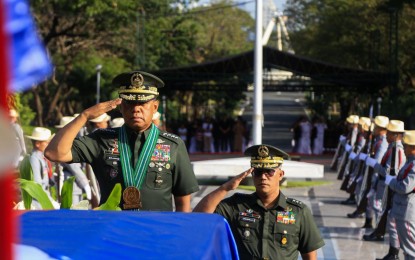 <p><strong>HONORING FALLEN SOLDIERS.</strong> Armed Forces of the Philippines chief Gen. Romeo Brawner Jr. pays tribute to fallen soldiers during a wreath-laying ceremony on Friday (Dec. 15, 2023) at the Libingan ng mga Bayani in Taguig City. The activity is part of the 88th anniversary of the AFP which will culminate on Dec. 21. <em>(Photo courtesy of the AFP)</em></p>
