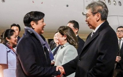 <p><strong>JUST ARRIVED.</strong> President Ferdinand R. Marcos Jr. (left) and party land at Haneda International Airport in Tokyo, Japan on Friday night (Dec. 15, 2023). He will participate in the 50th Commemorative ASEAN-Japan Friendship and Cooperation Summit.<em> (Photo courtesy of PCO)</em></p>