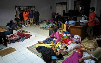 <p><strong>DISPLACED.</strong> The Provincial Disaster Risk Reduction and Management Office in Surigao del Sur reported that Tropical Storm Kabayan has affected some 15,705 families or 57,718 individuals in 70 barangays as of Monday (Dec. 18, 2023). Photo shows some of the evacuees from the affected barangays in Bislig City, Surigao del Sur, seeking temporary refuge in a designated evacuation center. <em>(Photo courtesy of Bislig LGU)</em></p>