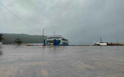 <p><strong>'KABAYAN'.</strong> A passenger vessel is left at its anchorage in Poro Port on Camotes Island as the Philippine Coast Guard on Monday (Dec. 18, 2023) suspended sea travels in anticipation of the effects of Tropical Depression Kabayan. PCG-Central Visayas spokesperson Commander Mark Larsen Mariano said they recorded 1,295 stranded passengers, with 300 of them evacuated by the Cebu City local government unit to Cebu City Sports Center as rain intensified. <em>(Photo courtesy of Cebu Port Authority)</em></p>