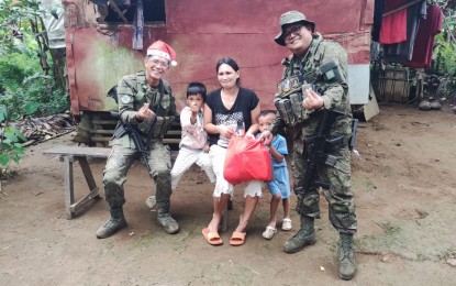 <p><strong>CHIRSTMAS SPIRIT.</strong> Soldiers led by Philippine Army 802<sup>nd</sup> Infantry Brigade commander Brig. Gen. Noel Vestuir (left) brought Christmas cheers to a previously rebel-influenced remote village in Eastern Samar on Dec. 18, 2023. The activity is part of the army's effort to block the recovery attempts of the New People’s Army. <em>(Photo courtesy of Philippine Army) </em></p>