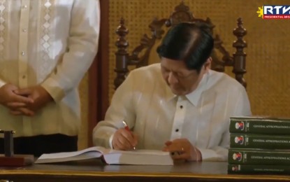 Marcos signs 5 new laws