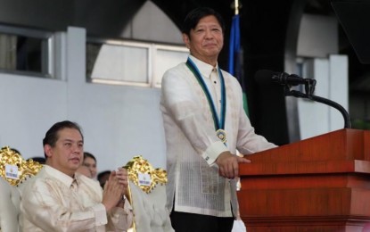 <p><strong>FRUITFUL.</strong> Speaker Ferdinand Martin Romualdez applauds as President Ferdinand R. Marcos Jr. delivers his message during the celebration of the 88th anniversary of the Armed Forces of the Philippines at Camp Aguinaldo, Quezon City on Thursday. Romualdez on Friday (Dec. 22, 2023) lauded Marcos for the President’s fruitful visit to Japan early this year that resulted in PHP170-billion actual investment. <em>(Photo courtesy of Speaker's Office)</em></p>