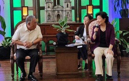 <p><strong>GUANGDONG-CEBU FLIGHTS</strong>. Cebu Vice Governor Hilario Davide III (left) listens as Chinese People's Political Consultative Conference's (CPPCC) Guangdong Provincial Committee vice chair Li Xin speaks during the latter’s visit to the Cebu Provincial Capitol on Thursday (Dec. 21, 2023). Davide proposed that Li establish direct flights between Guangdong, China and the Mactan-Cebu International Airport, which is seen to boost economic cooperation. <em>(Photo courtesy of Cebu Capitol PIO)</em></p>