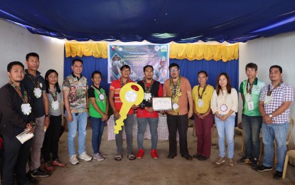 <p><strong>SUPPORT TO THE TRIBE.</strong> Regional Executive Director Ricardo Oñate Jr. (5th from right) of the Department of Agriculture in the Caraga leads the turnover of the PHP8.6 million project on Dec. 21, 2023 to Sibagat Manobo Dairy Producers Development Association, an indigenous people’s group in Barangay Padiay, Sibagat, Agusan del Sur. The project is funded under the DA’s Kabuhayan at Kaunlaran ng Kababayang Katutubo Program. <em>(Photo courtesy of DA-13)</em></p>