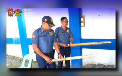 <p><strong>CONFISCATED.</strong> Brig. Gen. Andre Dizon, Police Regional Office-5 (Bicol) acting director, inspects confiscated mother rockets or "boga" in this undated photo. PRO5 on Tuesday (Jan. 2, 2024) reported 61 firecracker-related incidents with one fatality during the New Year celebration. <em>(Photo from Brig. Gen. Dizon's Facebook page)</em></p>