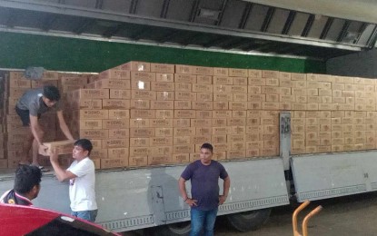 Typhoon-hit residents in Surigao Sur, Dinagat get gov't aid