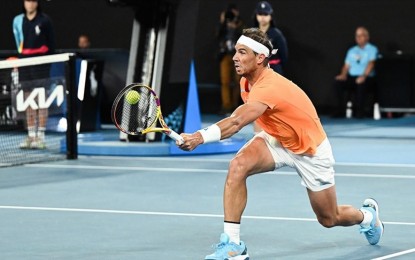 Nadal back in business with 1st win in nearly a year