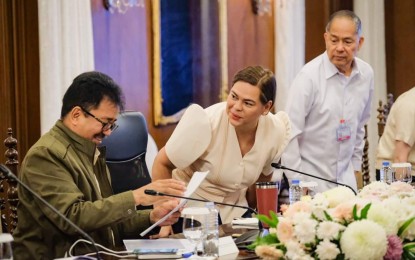 <p><strong>CLOSE COORDINATION. </strong>Commission on Higher Education (CHED) Chairperson J. Prospero De Vera III (left) and Vice President and Education Sceretary Sara Duterte (center) attend a sectoral meeting in Malacañang on July 11, 2023. Senators urged on Thursday (Jan. 4, 2024) the Department of Education (DepEd) and CHED to sit down and plan for a seamless transition for senior high school students who will be possibly affected by the discontinuation of the program in state universities and colleges and local universities and colleges. <em>(Photo courtesy of Yummie Dingding/PPA pool) </em></p>