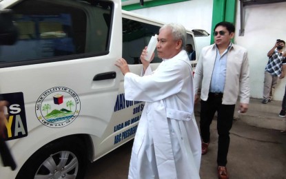 <p><strong>EMERGENCY RESPONSE</strong>. One of the five new ambulances recently purchased by the municipality of Sariaya in Quezon province is blessed by a priest at the town hall on Monday (Jan. 8, 2024). In addition to the ambulances, the local government also bought a pick-up truck for local firefighters. <em>(PNA photo by Belinda Otordoz)</em></p>