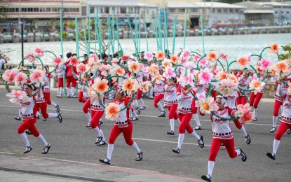 <p><strong>OPENING SALVO.</strong> A participating festival performs at the Iloilo Freedom Grandstand during the opening salvo of the Kasadyahanan sa Kabanwahanan on Jan. 5, 2023. The Iloilo City Traffic Management Unit advised the public to get ready to walk amid the expanded road closures this coming Jan. 12 for the main opening salvo of the Dinagyang Festival. <em>(Photo courtesy of Iloilo Dinagyang Festival FB page)</em></p>