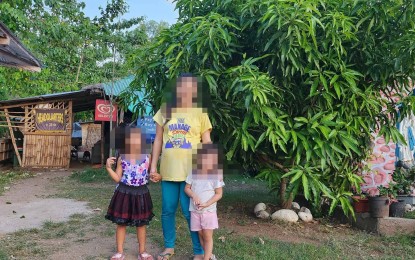<p><strong>BRIGHTER FUTURE.</strong> A 29-year-old pregnant former rebel is reunited with her two children after she left the New People's Army and surrendered to the military and police in Siaton, Negros Oriental on Dec. 18, 2023. “Ka Aubrey” celebrated her birthday on Sunday (Jan. 6, 2024) with her two daughters, whom she did not see for three years. <em>(Contributed photo)</em></p>