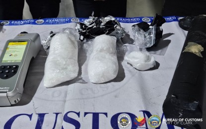 <p><strong>BUSTED.</strong> Customs officers at the Port of Clark prevent the export of a shipment containing shabu with an estimated street value of PHP7.5 million to New Zealand on Jan. 3, 2024. The Bureau of Customs on Wednesday (Jan. 10) said the shipment immediately underwent K9 sniffing and physical examination, which resulted in the discovery of three packs of shabu weighing 1.1 kilograms concealed inside a shaft drive. <em>(Photo courtesy of BOC-Port of Clark)</em></p>