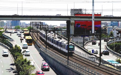 <p><strong>FREE RIDES FOR VETERANS.</strong> A Metro Rail Transit (MRT) 3 train approaches the Magallanes Station in Makati City on Jan. 10, 2024. The MRT-3 is set to offer free rides to Filipino veterans during the Philippine Veterans' Week from April 5 to 11.<em> (PNA photo by Ben Briones)</em></p>