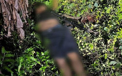 <p><strong>SLAIN REBEL.</strong> The body of a high-ranking leader of the New People’s Army (NPA) who was slain in a clash with government troops in Gubat, Sorsogon on Sunday (Jan. 14, 2024). The firefight that lasted for 25 minutes also resulted in the seizure of an M4 rifle, magazines and an improvised explosive device.<em> (Photo courtesy of 9th Infantry Division)</em></p>