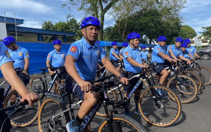 <p><strong>POLICE VISIBILITY</strong>. Police Regional Office 5 (Bicol) Regional Director Brig. Gen. Andre Sizon (left) leads a team of 20 bike patrollers to the congested areas of Daraga and Legazpi City, Albay on Tuesday (Jan. 16, 2024). The new Bike Patrol Unit aims to enhance police visibility and ensure safety and security of the people in the region. <em>(Photo by Connie Calipay)</em></p>