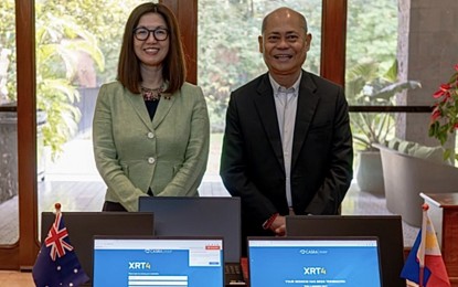 <p><strong>ENHANCED AVIATION SECURITY.</strong> Australian Ambassador to the Philippines HK Yu PSM hands over XRT4 laptops to OTS officer-in-charge Assistant Secretary Jose Briones Jr. to enhance mutual aviation security on Jan. 10, 2024. The training software uses cutting-edge technology to enhance the ability of aviation screeners to recognize and identify prohibited items in passenger baggage.<em> (Photo courtesy of Australian Embassy in Manila)</em></p>