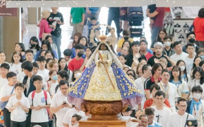 <p><strong>MARIAN DEVOTION</strong>. A replica image of the Virgin of Antipolo is carried in a procession in this undated photo. The Shrine of Our Lady of Peace and Good Voyage in the city will be elevated into an "international shrine" on Jan. 26, 2024.<em> (Photo from the Facebook page of Antipolo Cathedral)</em></p>