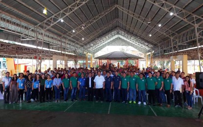 <p><strong>AWARDING</strong>. Officials of the Philippine Drug Enforcement Agency-Pangasinan and the municipality of Agno pose for a photo after the ceremony for the drug-cleared status certification on Thursday (Jan.18, 2024) held at the gymnasium in Barangay Poblacion in Agno town. The PDEA has been strengthening its anti- illegal drugs campaign by working closely with village officials. <em>(Photo courtesy of PDEA Pangasinan)</em></p>