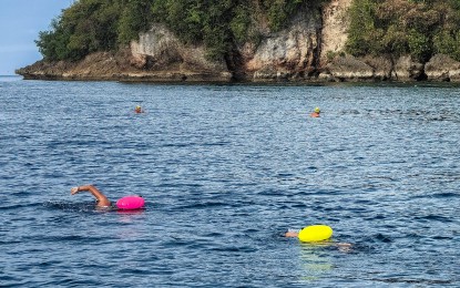 <p><strong>SITE ASSESSMENT.</strong> The final assessment and reconnaissance swim for the Western Visayas International Open Water Swim Circuit is conducted at the Campomanes-Ballo Marine Reserve and Sanctuary in Sipalay City, Negros Occidental on Jan. 14, 2024. Some 200 local and international swimmers are expected to see action in the event which will be held on Feb. 18. <em>(Photo courtesy of Sipalay City Tourism Office)</em></p>