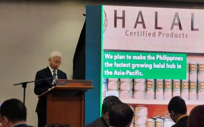 <p><strong>DOUBLING OUTPUT</strong>. Trade Secretary Alfredo Pascual leads the launching of the Philippine Halal Industry Development Strategic Plan at the World Trade Center, Pasay City on Tuesday (Jan. 23, 2024). The blueprint aims to double the country's halal-certified products and services from 3,000 to 6,000. <em>(PNA photo by Kris Crismundo)</em></p>
