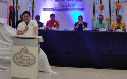 <p><strong>CITYHOOD GOALS</strong>. Mayor Marcelo Gayeta (on podium) of Sariaya, Quezon updates the local media about the goal of converting the town into a city before his term ends in 2025 on Tuesday (Jan. 23, 2024). The municipality is now qualified, having a PHP120-million annual income and a population of 150,000. <em>(Photo by Belinda Otordoz)</em></p>
