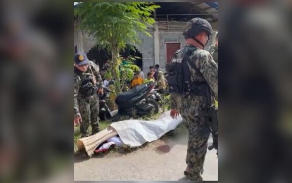 <p><strong>AMBUSHED.</strong> Police conduct a post-crime investigation on the murder of a school headteacher along the highway in Barangay Manongkaling, Mamasapano, Maguindanao del Sur, on Monday (Jan. 22, 2024). The victim, identified as Mamadatu Dalandas, school head of Datu Tecson Elementary School in neighboring Sultan sa Barongis town, was driving his motorbike along the Manongkaling area when ambushed by motorcycle riding-in-tandem gunmen.<em> (Photo from Mamasapano MPS)</em></p>