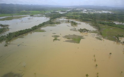 <p><strong>TRAIL OF DESTRUCTION.</strong> An aerial shot shows the effects of the shear line to communities in the province of Davao de Oro on Jan. 16, 2024. The NDRRMC on Tuesday (Jan. 23) said the government has extended some PHP62.57 million worth of assistance to communities affected by the shear line in Mindanao. <em>(Photo courtesy of Davao de Oro PIO)</em></p>