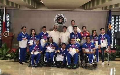 <p><strong>HONORING PARA-ATHLETES.</strong> President Ferdinand R. Marcos Jr. on Wednesday (Jan. 24, 2024) leads the ceremonial awarding of incentives to the Filipino medalists in the 4th Asian Para Games held in Hangzhou, China in October 2023. The awarding ceremony was held at the Heroes Hall of Malacañan Palace in Manila. <em>(Photo from Malacañang Press Corps Pool)</em></p>