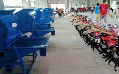 <p><strong>AID FOR FARMERS.</strong> The PHP5-million farm equipment received by eight farmers' associations in Legazpi City on Tuesday (Jan. 23, 2024). Distributed by the local government unit were hand tractors with trailers, palay threshers, greenhouses, mini-cultivators and flat-bed dryers.<em> (Photo courtesy of Mayor Carmen Geraldine Rosal)</em></p>