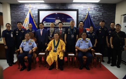 <p><strong>RECOGNITION.</strong> Philippine Coast Guard (PCG) Deputy Commandant for Operations (seated, left to right), Vice Admiral Rolando Lizor Punzalan Jr. Korean World Green International Award Committee (KWGIC) Chair Park Kwang Young, and PCG Deputy Commandant for Administration, CG Vice Admiral Allan Victor Dela Vega pose with other PCG officials after the awarding of three PCG officers for their efforts in protecting the country's maritime environment at the PCG Headquarters in Port Area, Manila on Thursday (Jan. 25, 2024). Both Punzalan and Dela Vega were recognized with the 'Top Excellence Award' while the 'Excellence Award' was given to PCG District Bangsamoro Autonomous Region in Muslim Mindanao (BARMM) Commander, Captain Christopher Auro. <em>(Photo courtesy of PCG)</em></p>