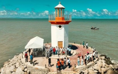 <p><strong>BEACON OF HOPE.</strong> Philippine Coast Guard and local government officials lead the inauguration of the PHP10-million lighthouse off the commercial port in Barangay Banquerohan, Cadiz City on Wednesday (Jan. 24, 2024). Mayor Salvador Escalante Jr. said the new lighthouse serves as a beacon of hope to the city’s flourishing economy. <em>(Photo courtesy of Cadiz City government)</em></p>