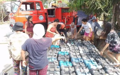 <p><strong>WATER RATIONING.</strong> The municipal fire station in Sibalom conducts water rationing in a barangay experiencing water scarcity due to the El Niño phenomenon in this undated photo. Bureau of Fire Protection (BFP) Antique information officer Fire Officer 2 Eulie May Raymaro said in an interview Friday (Jan. 26, 2024) that they are ready to assist local government units in bringing water to their constituents. (<em>Photo courtesy of Bureau of Fire Protection Antique</em>)</p>