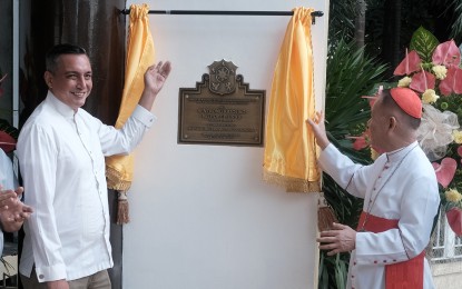 <div><strong>HONOR.</strong> National Museum of the Philippines Director General Jeremy Barns (left) and Manila Archbishop Cardinal Jose Advincula unveil the marker declaring the Pope Pius XII Catholic Center in United Nations Avenue, Paco, Manila as an important cultural property on Saturday (Jan. 27, 2024). The center was inaugurated on Aug. 26, 1964 by Cardinal Rufino Santos, the Archbishop of Manila from 1953 to 1973 and the first Filipino elevated to the rank of cardinal. <em>(Photo courtesy of CBCP)</em></div>