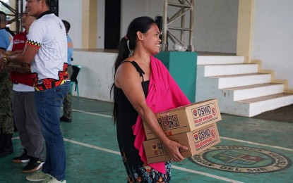 <p><strong>FOOD AID.</strong> The Department of Social Welfare and Development-Caraga distributed 3,590 family food packs to the flood-affected residents of Veruela and Sta. Josefa towns in Agusan del Sur province on Monday (Jan. 30, 2024). The agency also reported that 5,100 food packs are in transit to Bunawan town. <em>(Photo courtesy of DSWD-13)</em></p>