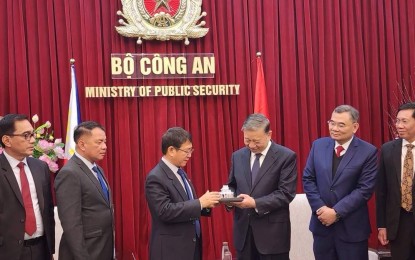 <p><strong>FIGHTING TERRORISM.</strong> National Security Adviser (NSA) Eduardo Año (3rd from left) receives a token of appreciation from Vietnamese Public Security Minister To Lam (3rd from right) during their meeting in Hanoi on Jan. 29, 2024, on the sidelines President Ferdinand R. Marcos Jr.'s state visit to Vietnam. During the meeting, Año raised the possibility of holding exchanges of views on each countries’ anti-terror laws and cooperating on simulation exercises to determine the best practices in the application of legal measures vis-a-vis extra-territoriality and border issues. <em>(Photo courtesy of the NSC)</em></p>