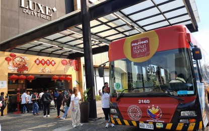 <p style="text-align: justify;"><strong>HOHO.</strong> One of the Hop-on Hop-off (HOHO) buses makes a stop at LUXE Duty Free in MOA Complex in this undated photo. LUXE is one of the 13 bus stops in the new HOHO Pasay-Paranaque Route. <em>(PNA photo by Joyce Rocamora)</em></p>
