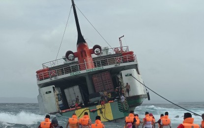<p><strong>DISTRESSED.</strong> The vessel that ran aground in Capul, Northern Samar, in this Feb. 12, 2024 photo. The 95 passengers of the distressed roll-on roll-off vessel left the island on Feb. 13 or two days after the incident. (<em>Photo courtesy of Jamaine Brainard - Pua</em>)</p>