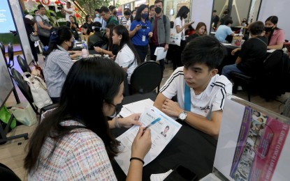 <p><strong>JOB HUNT.</strong> Jobseekers undergo interviews during a job fair held inside a mall in Caloocan City on Feb. 16, 2024. The DOLE on Tuesday (March 12) said the decrease in the number of unemployed Filipinos based on the latest Labor Force Participation Survey can be attributed to the country's growing economy.<em> (PNA file photo by Yancy Lim)</em></p>