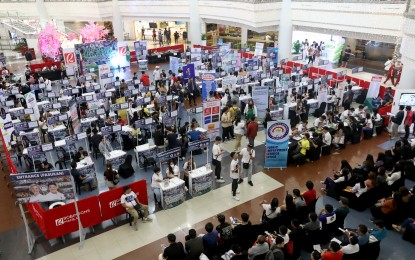 <p><strong>HIGH-QUALITY JOBS</strong>. Jobseekers queue up during a job fair in Manila last Feb. 23, 2024. The National Economic and Development Authority on Tuesday (March 12, 2024) led the signing of the implementing rules and regulations of Trabaho Para sa Bayan Act to provide high-quality jobs for Filipinos. <em>(PNA file photo by Yancy Lim)</em></p>