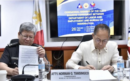 DOLE, BI ink pact on sharing of foreign workers' data