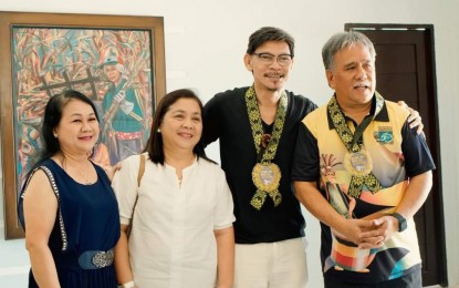 <p><strong>ART HUB</strong>. Mayor Salvador Escalante Jr. (right) with (from left) city accountant Delilah Fernandez, the mayor’s wife Mariel Escalante, and visionary artist Tom Alvarado at the recently-opened Balay Cadiznon, also known as the “House of Paintings” in Cadiz City, Negros Occidental. Some 70 paintings are now displayed inside the art center. <em>(Photo courtesy of Cadiz city government)</em></p>