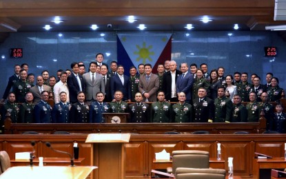 <p><strong>APPOINTED.</strong> Senate President Juan Miguel Zubiri (center) leads the confirmation of the ad interim appointments of the 46 generals/flag officers and senior officers of the Armed Forces of the Philippines on Wednesday (March 6, 2024). Zubiri also administered the oath of office of the new members of the Commission on Appointments -- Senators Joel Villanueva, Ramon Revilla, Ronald dela Rosa, and Raffy Tulfo. <em>(PNA photo by Avito Dalan)</em></p>