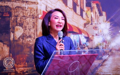 <p><strong>MORE TOURISTS.</strong> Tourism Secretary Christina Garcia Frasco announces the Philippines' latest arrival figures at the Internationale Tourismus-Börse (ITB) 2024 Convention in Germany on March 5, 2024. International tourist arrivals to the Philippines have tallied 1,227,815. <em>(Photo courtesy of DOT)</em></p>